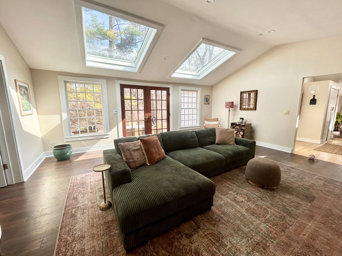 Sunlit living room with skylights